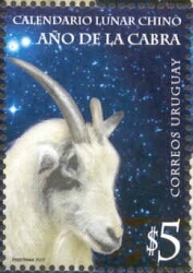 Foto de una cabra, con las estrellas de fondo. Cita: Calendario Lunar Chino. Año de la cabra.