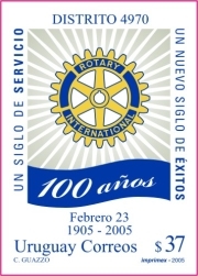 Logo de Rotary Internacional. A los costados se lee: 