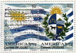 Ilustración de bandera uruguaya, acompañada de escudo nacional y partitura del himno nacional.