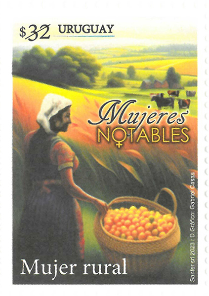 Mujer rural cosechando naranjas