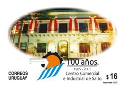 Fotografía de Edificio Sede de Centro Comercial e Industrial de Salto, junto a logo del mismo.